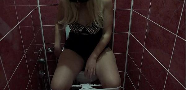 A blonde in a short skirt shows you her white panties and a delicious hairy pussy, shows how she pisses on the toilet. Amateur fetish.